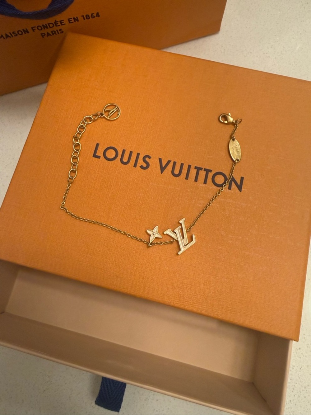 Louis Vuitton Gold-Tone LV Charm White Enamel Bracelet - Picture 3 of 6